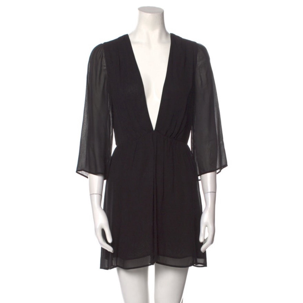 Beautiful! Reformation, deep v, black mini dress.